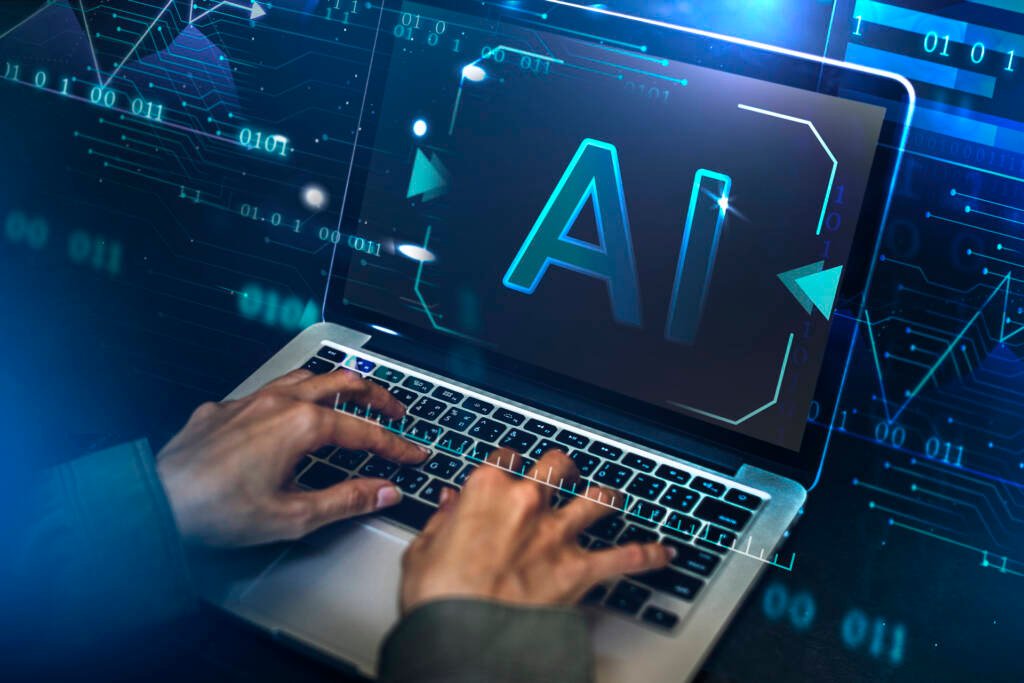 Pantalla de laptop con interfaz de inteligencia artificial utilizada para generar código mediante prompts